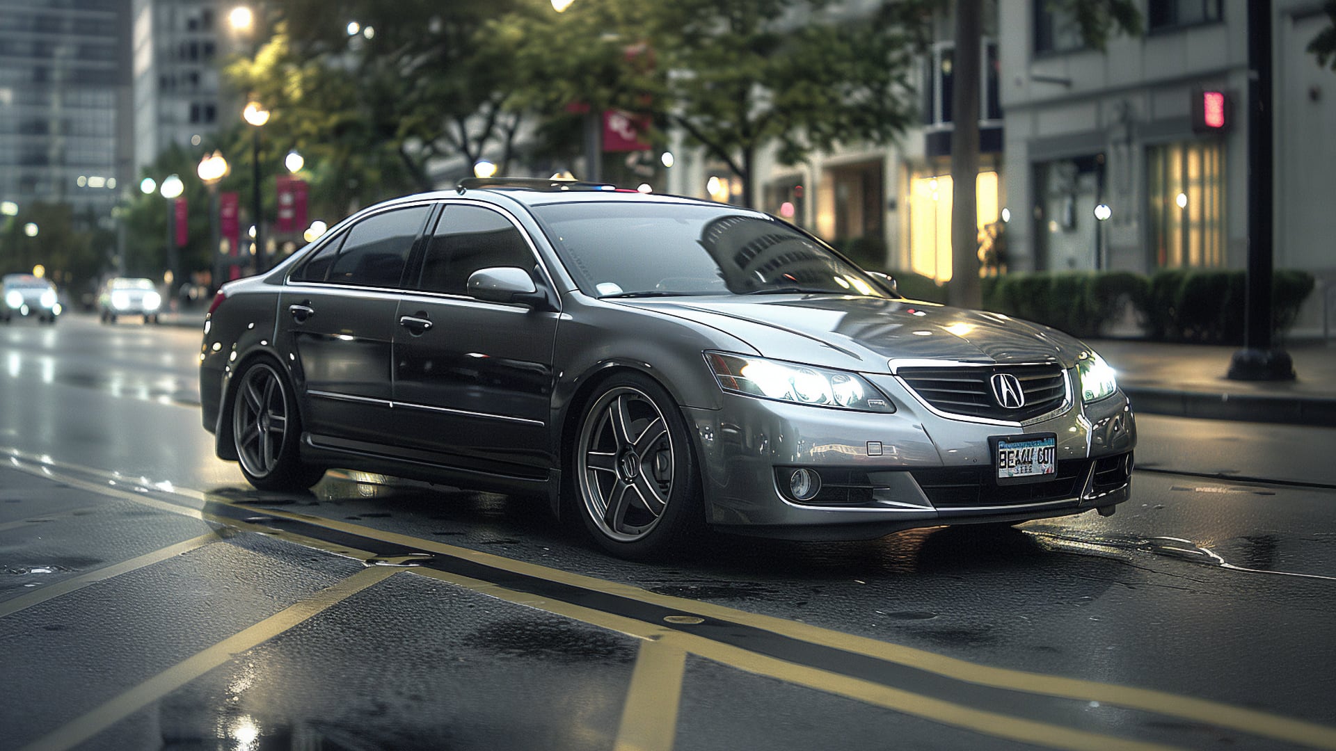 A silver Acura TL driving down a city street at night.