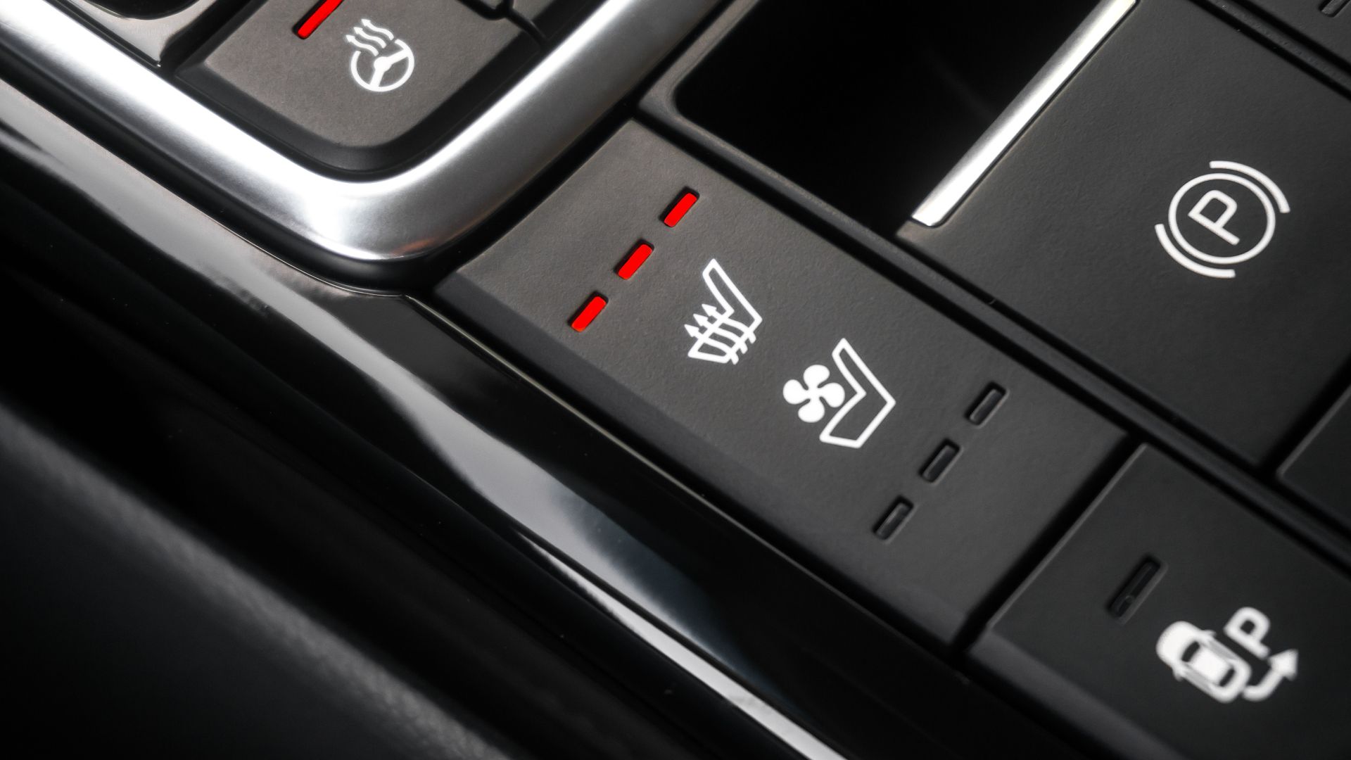 a close up of the buttons on a car.