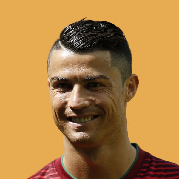 a man with a short haircut and a striped shirt.