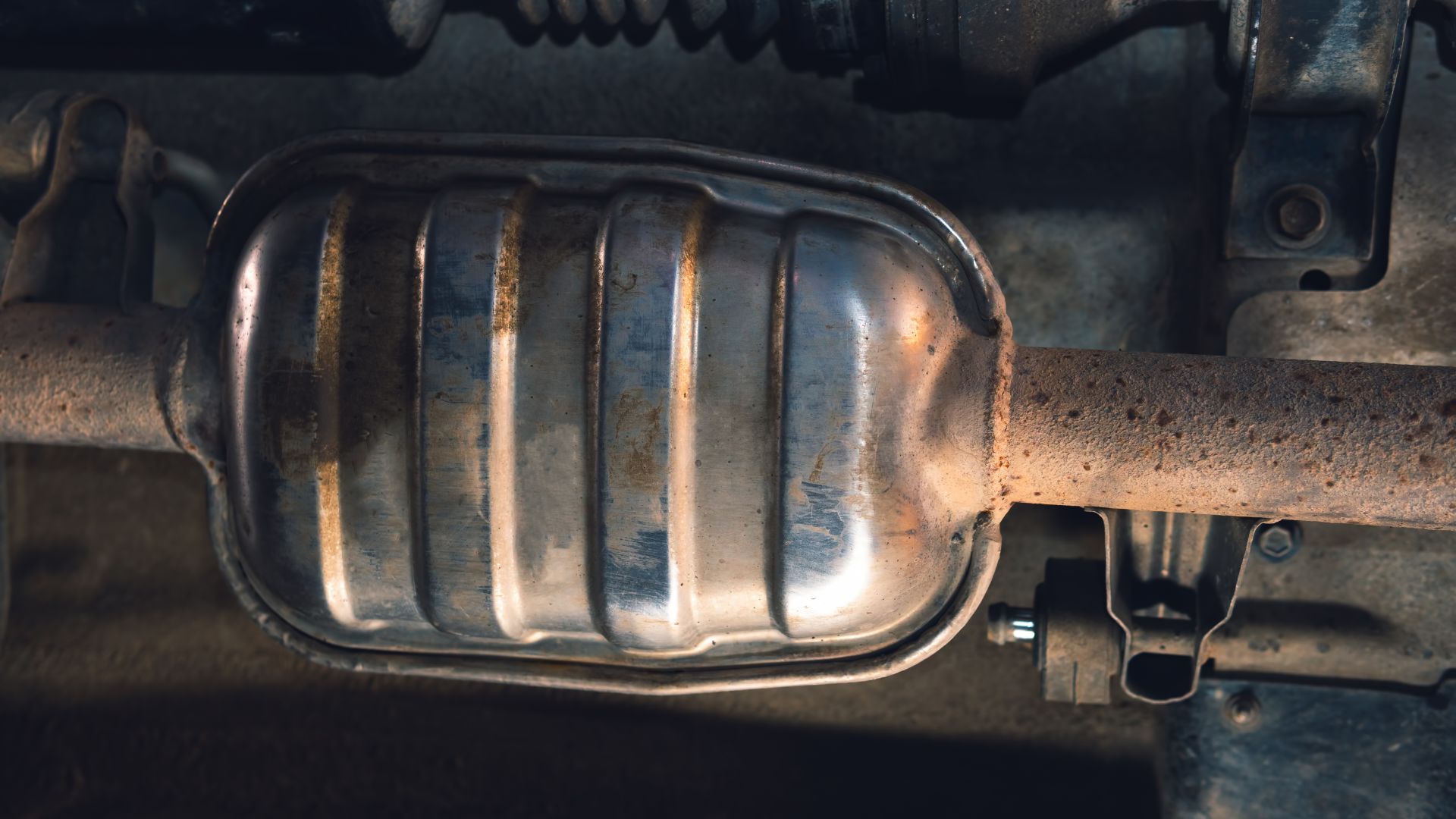 a close up of a metal object with rust.