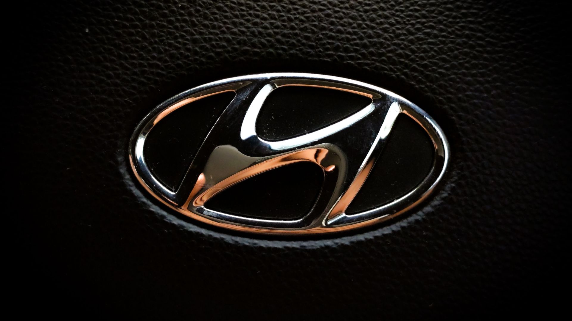 a close up of the emblem on a car.