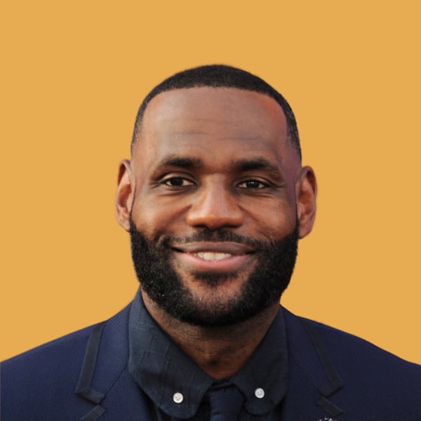 a man with a beard wearing a suit and tie.