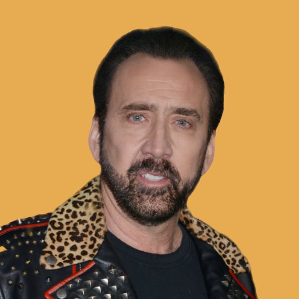 a man wearing a leopard print jacket and a black t - shirt.