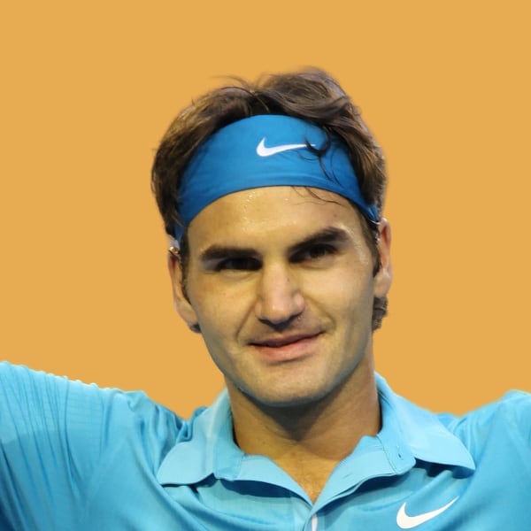 a man with a tennis racket in his hand.