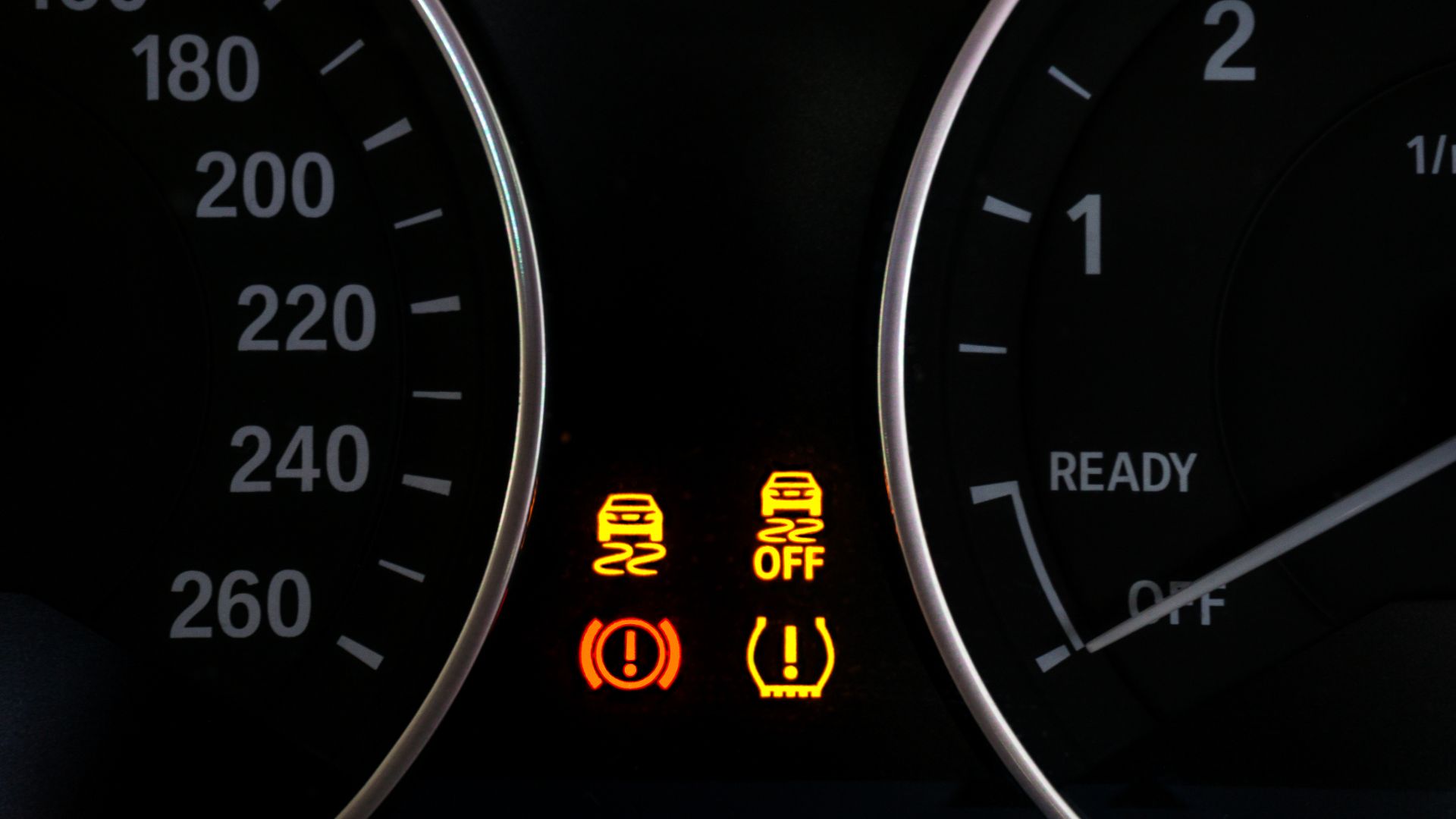 a close up of a speedometer on a car.