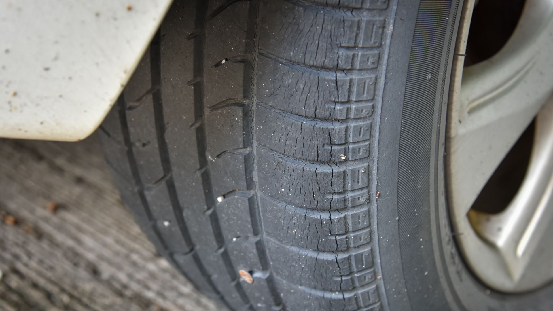a close up of a tire on a car.