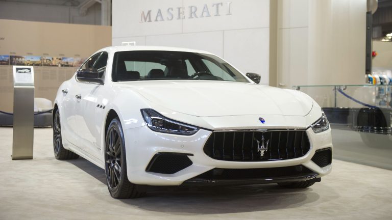 a maserat car on display at a car show.