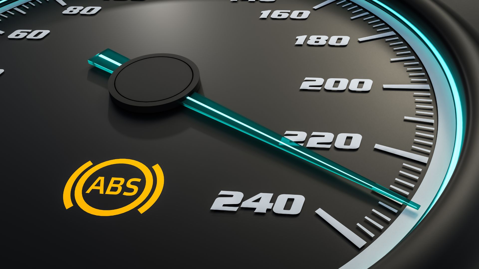 a close up of a speedometer with the words abs on it.