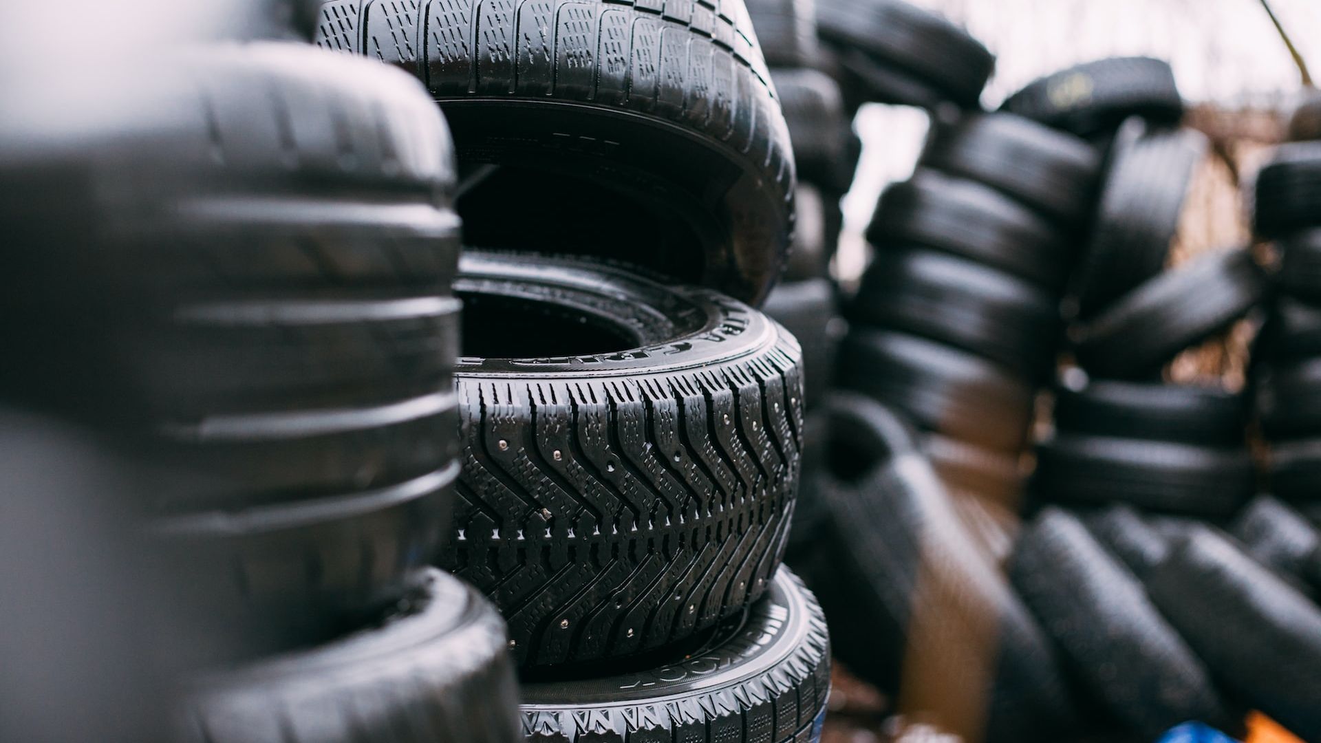 a pile of tires sitting next to each other.