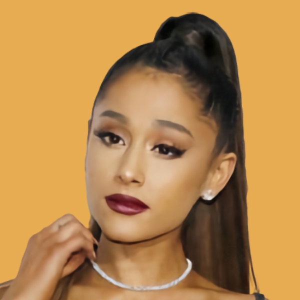 Ariana grande is posing with her hair in a ponytail.