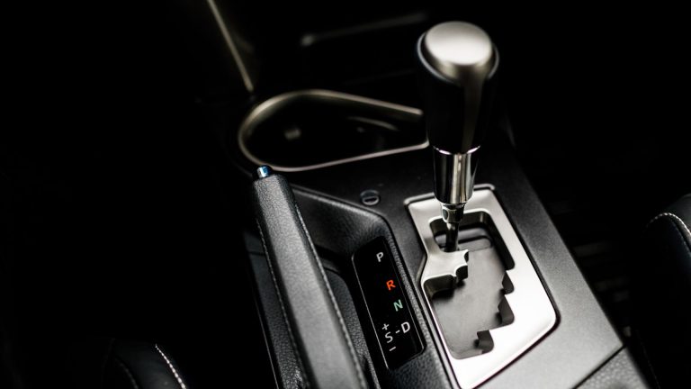 a close up of a steering wheel in a car.