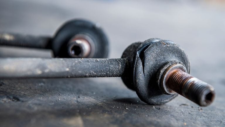 a close up of a metal object on the ground.