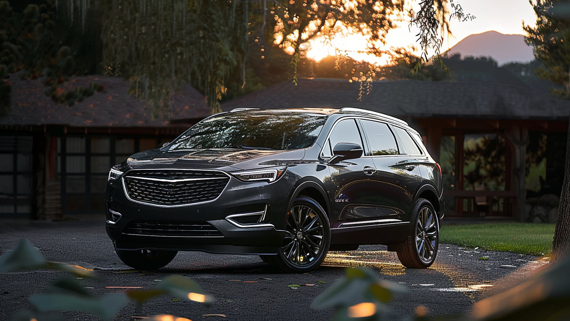 The 2020 Buick Enclave, one of the years to avoid, is parked in front of a house.