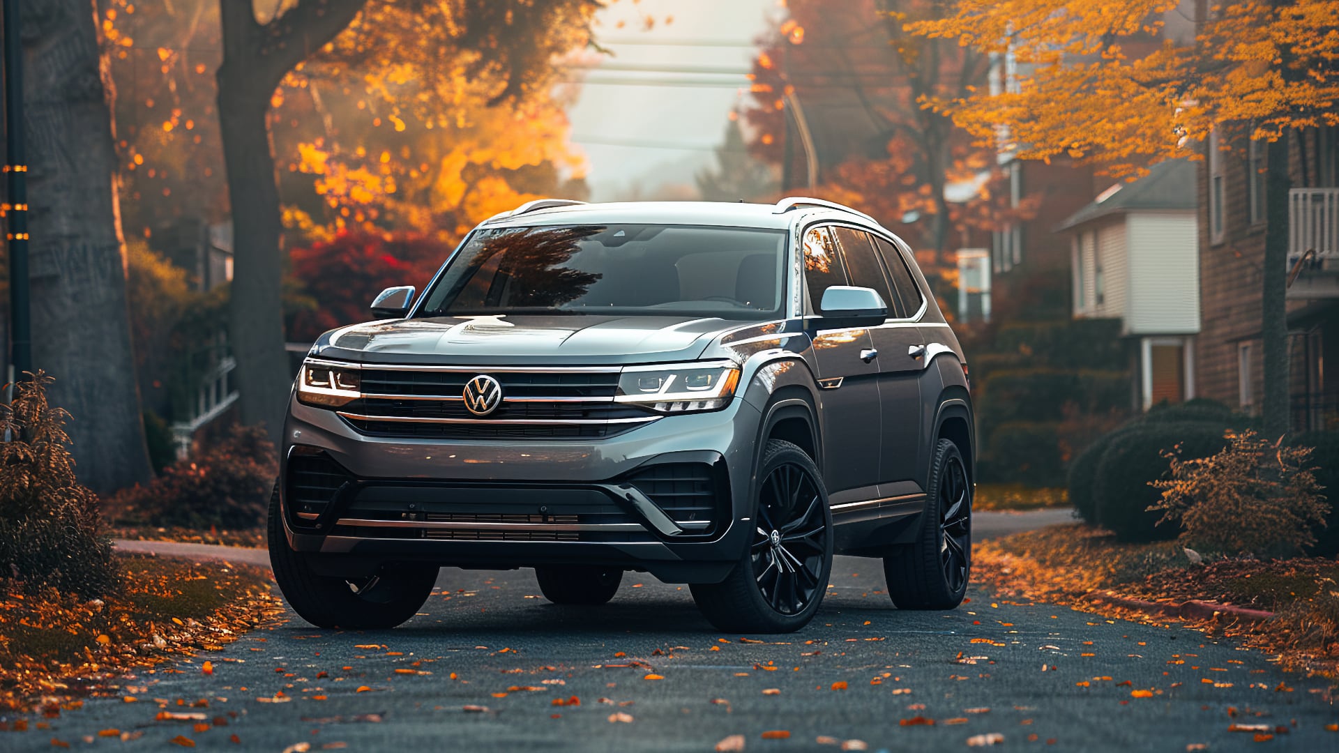The 2020 VW Atlas, one of the years to avoid, is parked on a street in autumn.