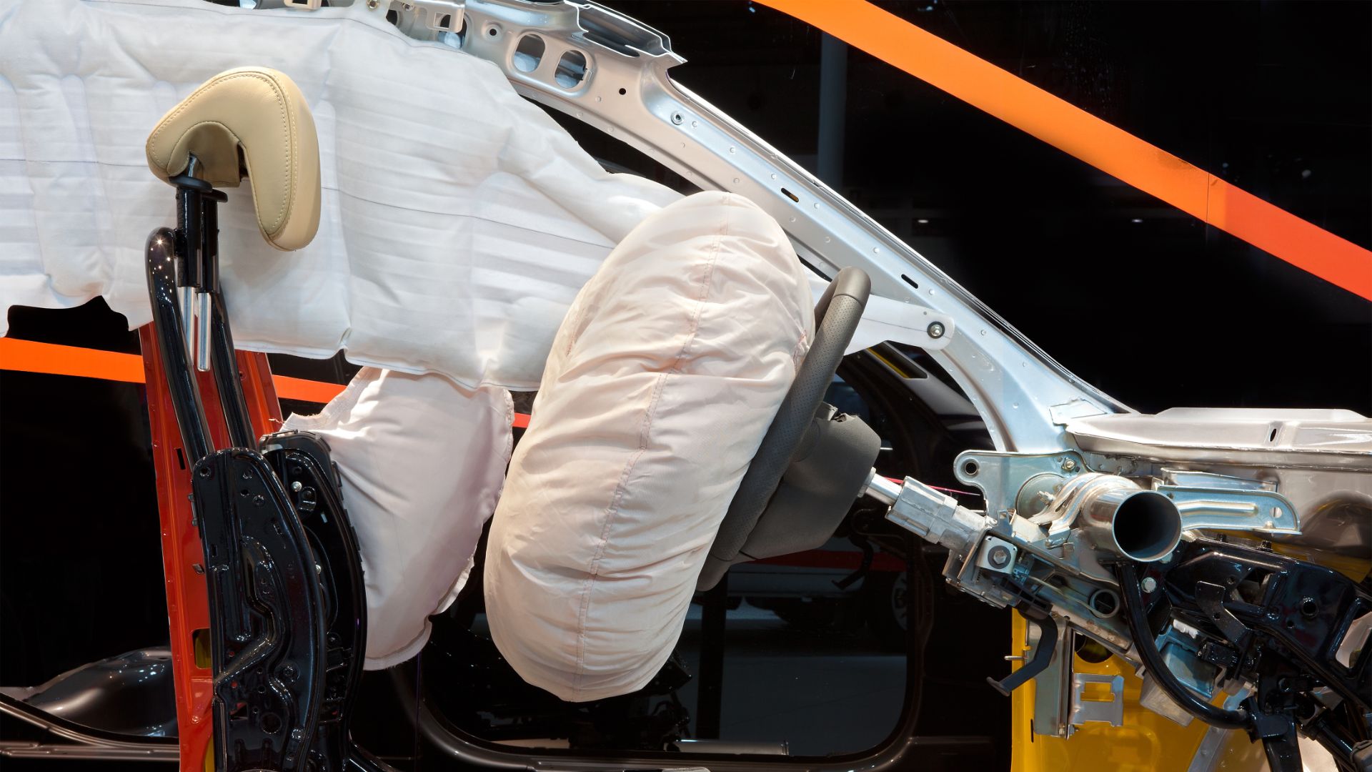 a car with a white sheet on it's door.