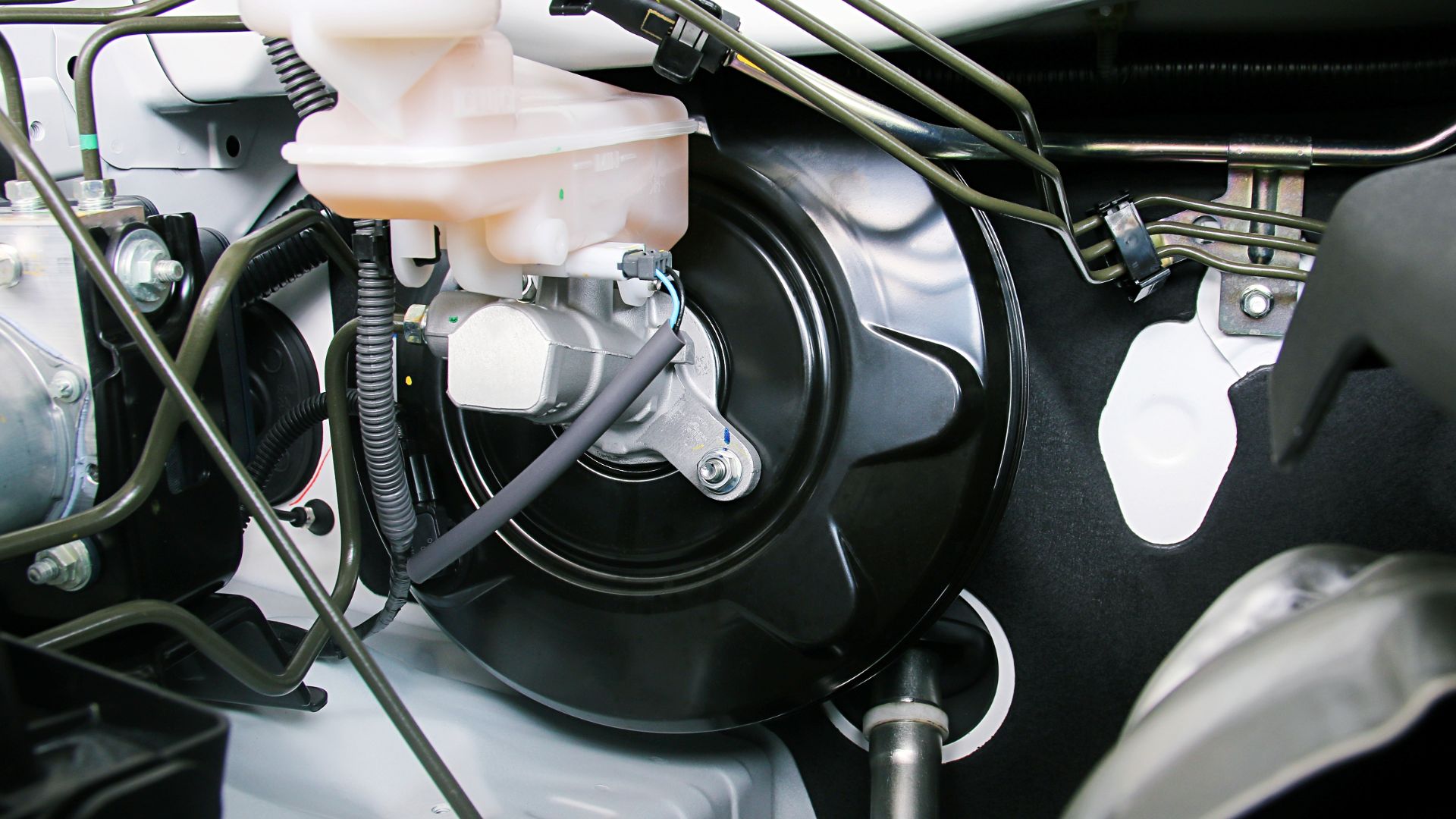 a close up of a motorcycle engine with a fuel tank.