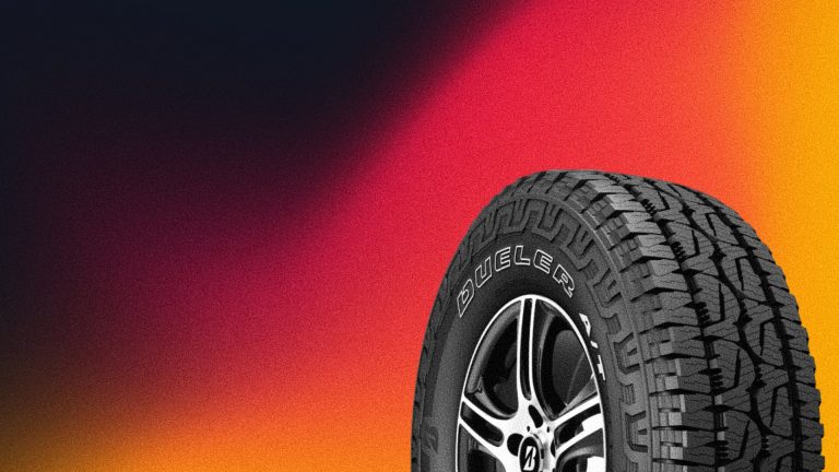 a close up of a tire on a colorful background.