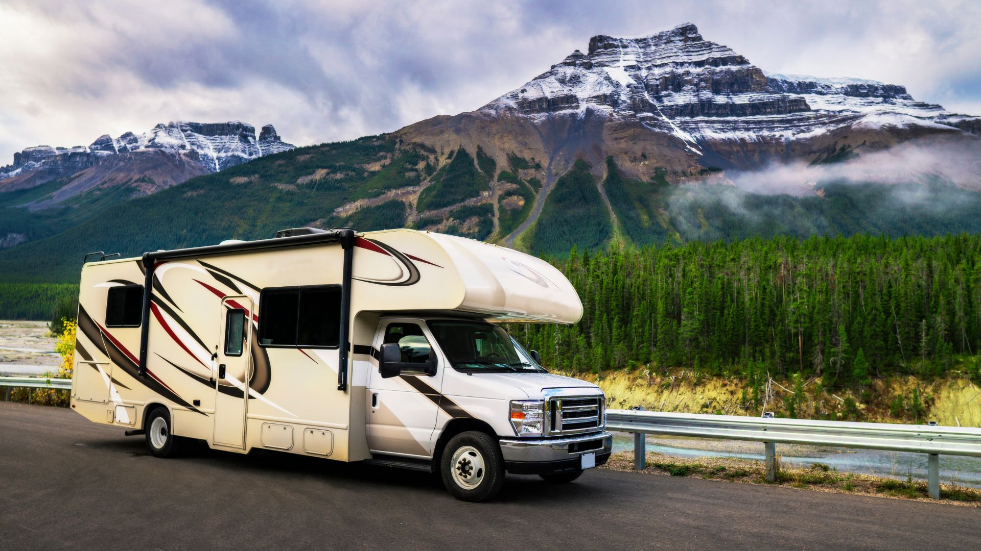 a motor home parked on the side of a road.