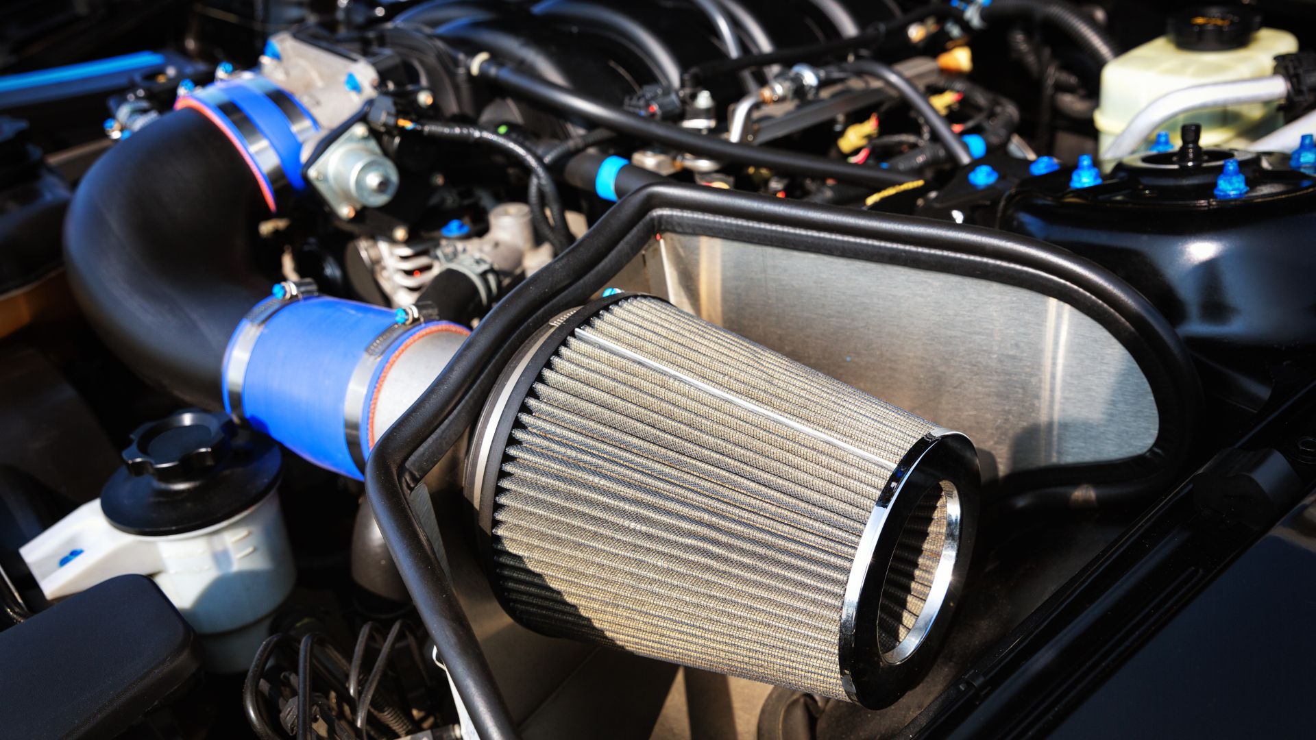 a close up of a car engine with a filter.