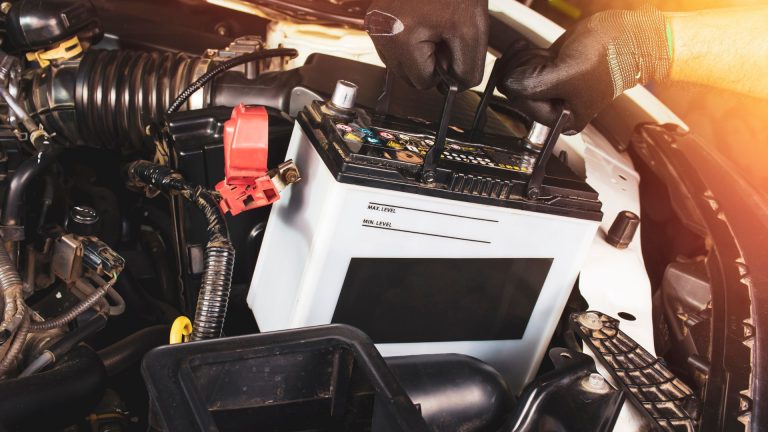 car battery replacement by mechanic