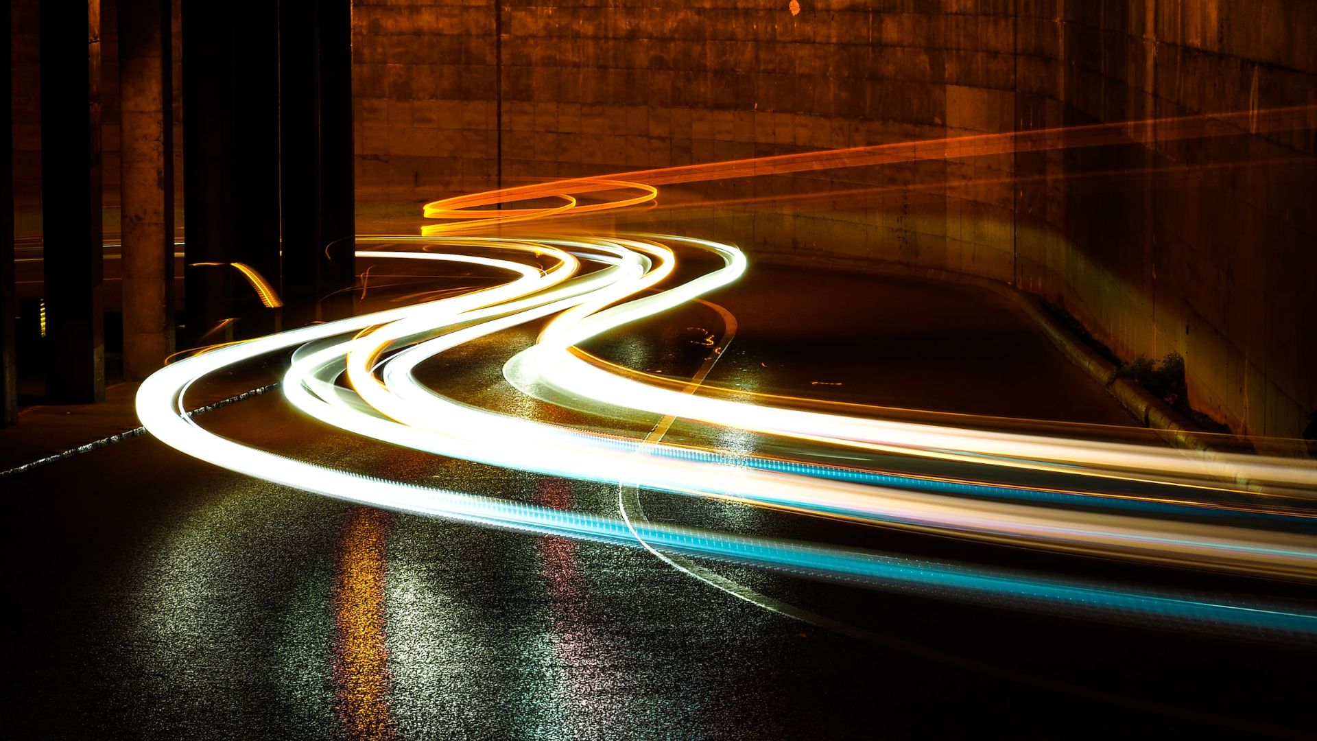 a blurry photo of a city street at night.