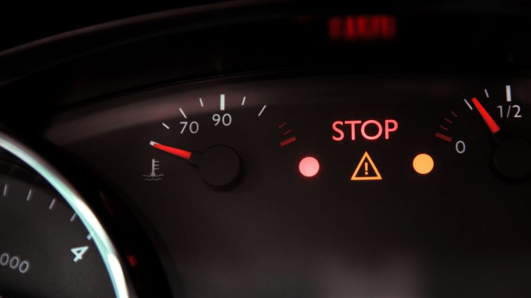 a close up of a speedometer in a car.