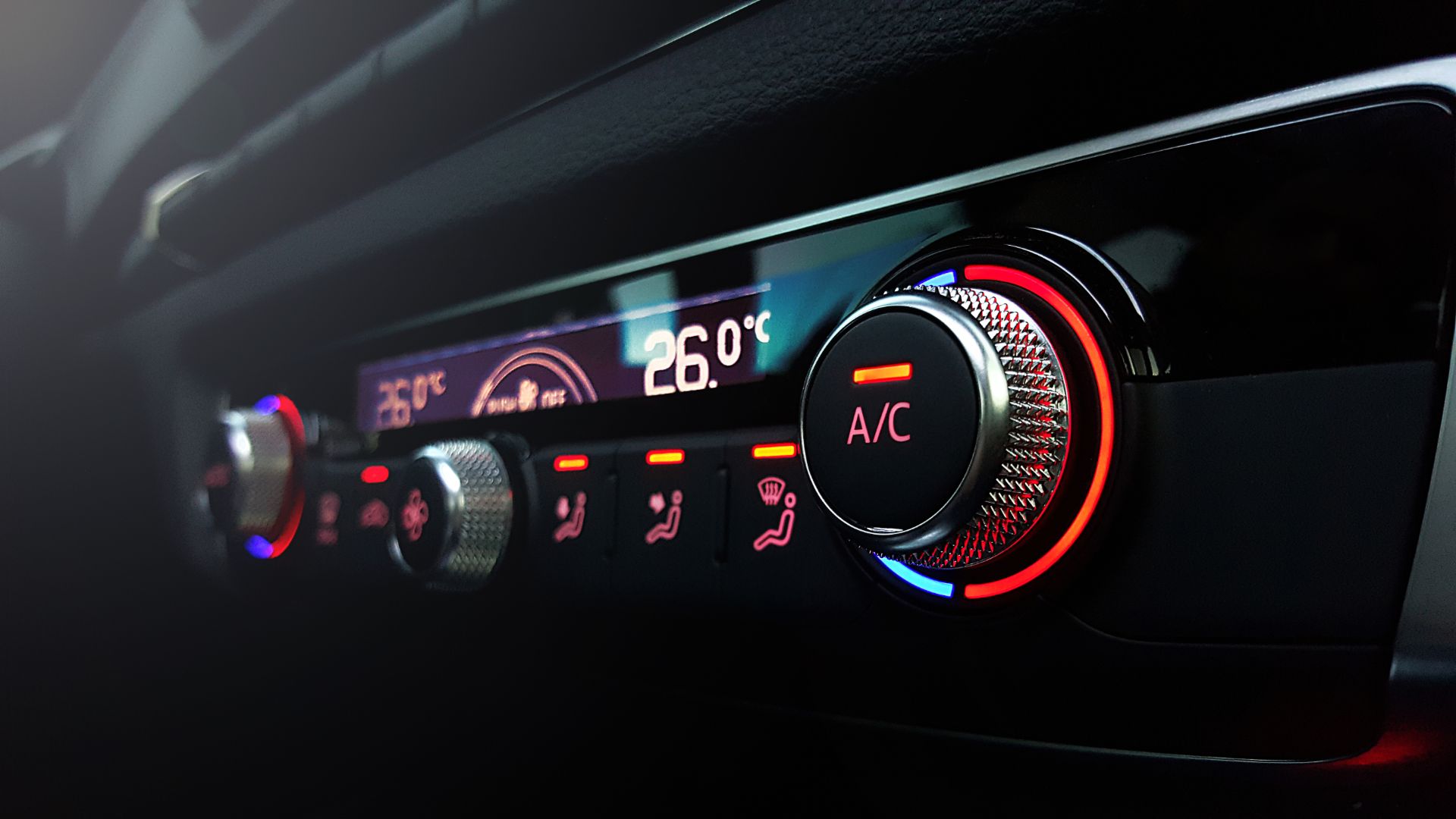 a close up of a radio in a vehicle.