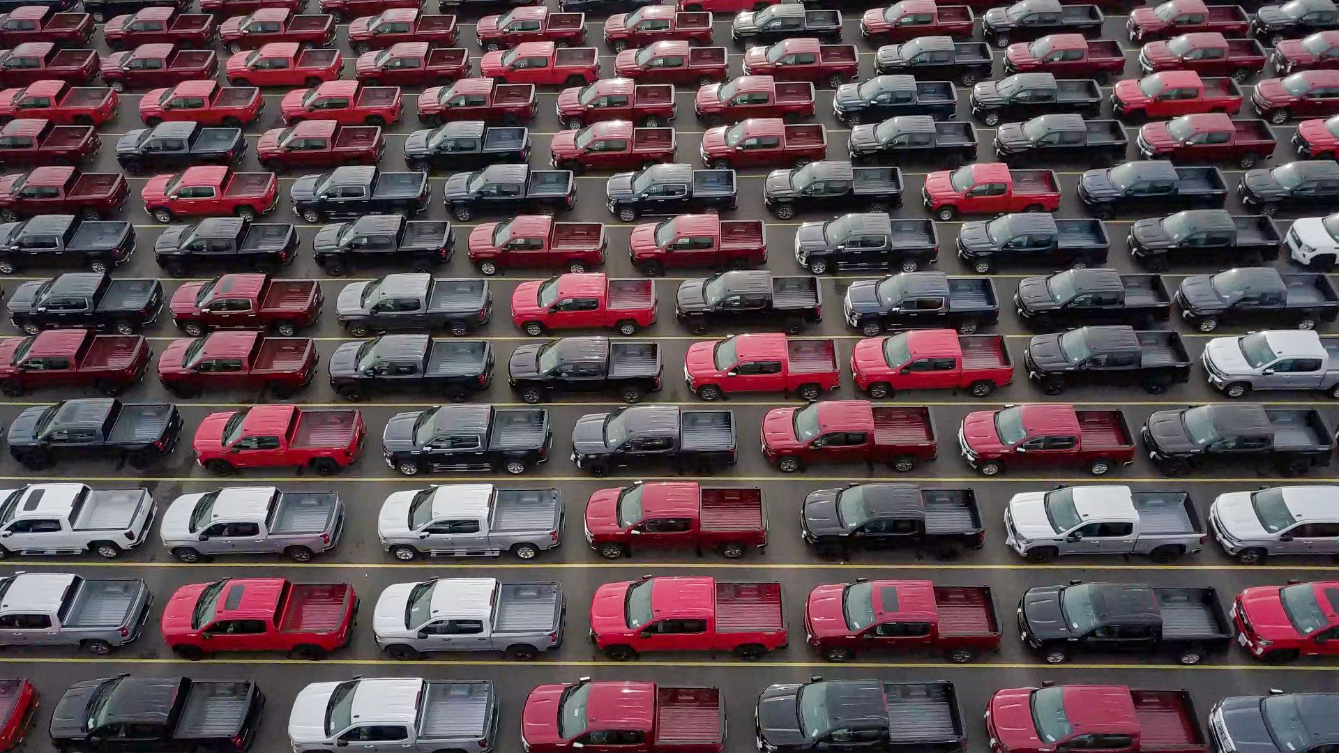 a large parking lot filled with lots of cars.