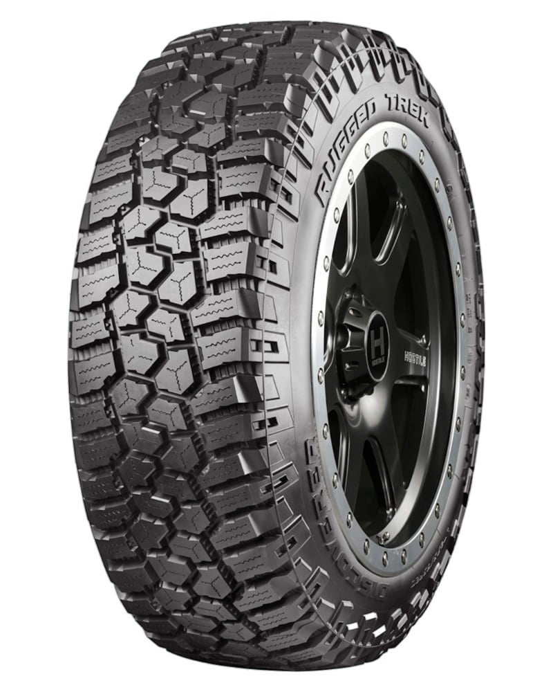 an all terrain tire on a white background.