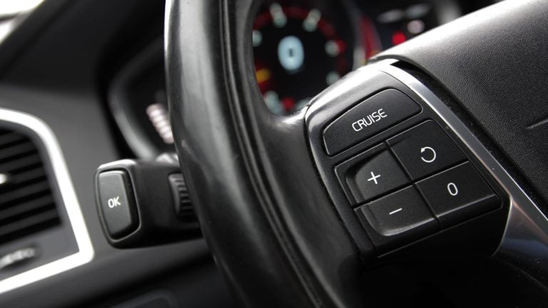 a close up of a car steering wheel.