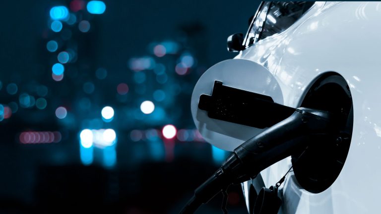 a close up of a gas pump at night.