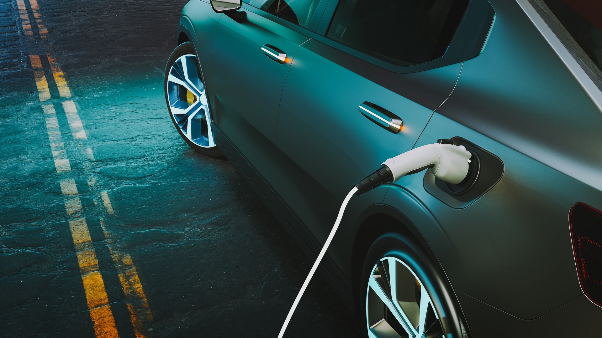 an electric car plugged into a charging station.