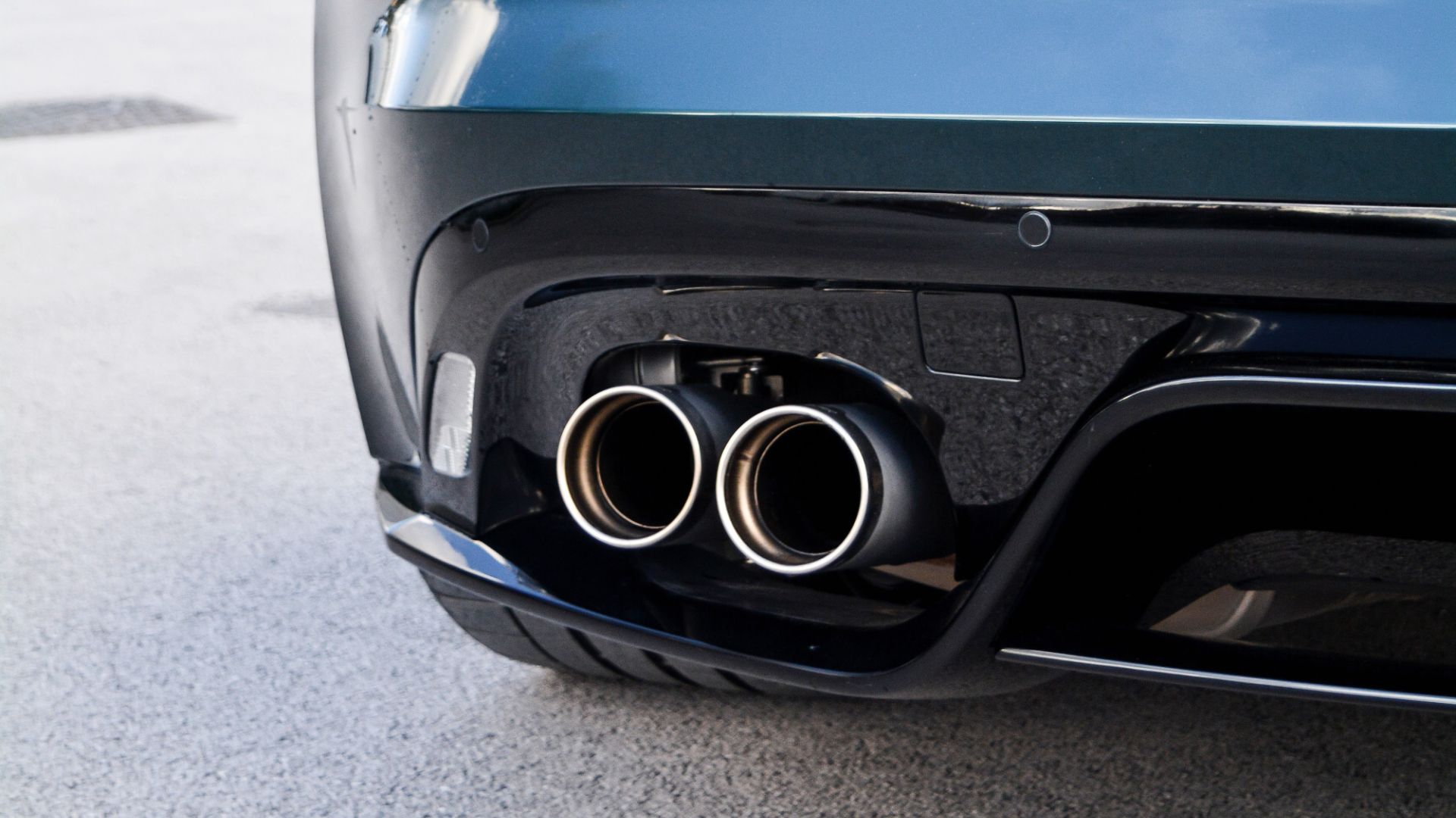 a close up of a car's exhaust pipe.