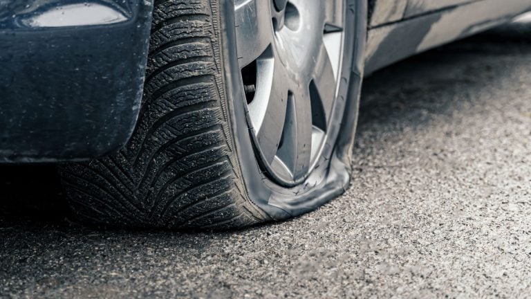 a close up of a tire on a car.