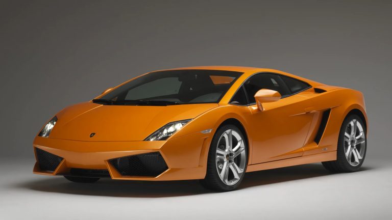 an orange sports car is shown in this image.