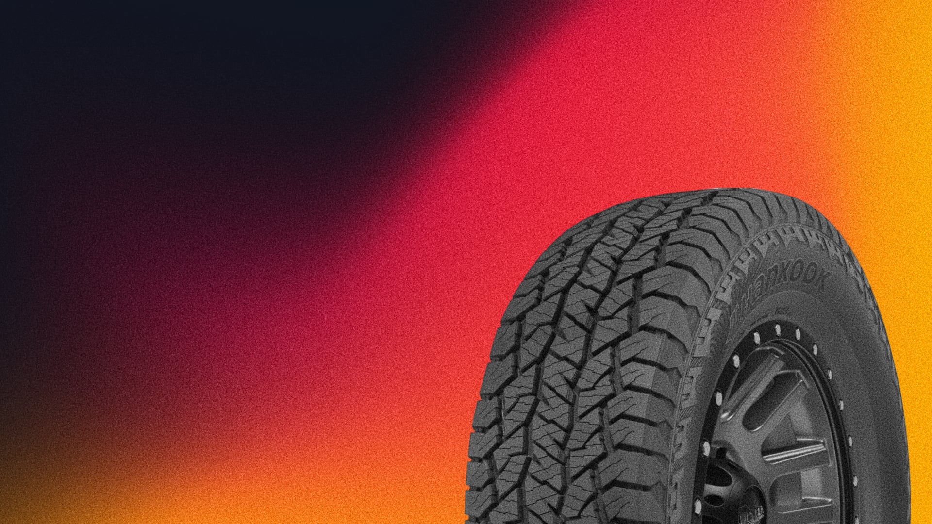 a close up of a tire on a colorful background.