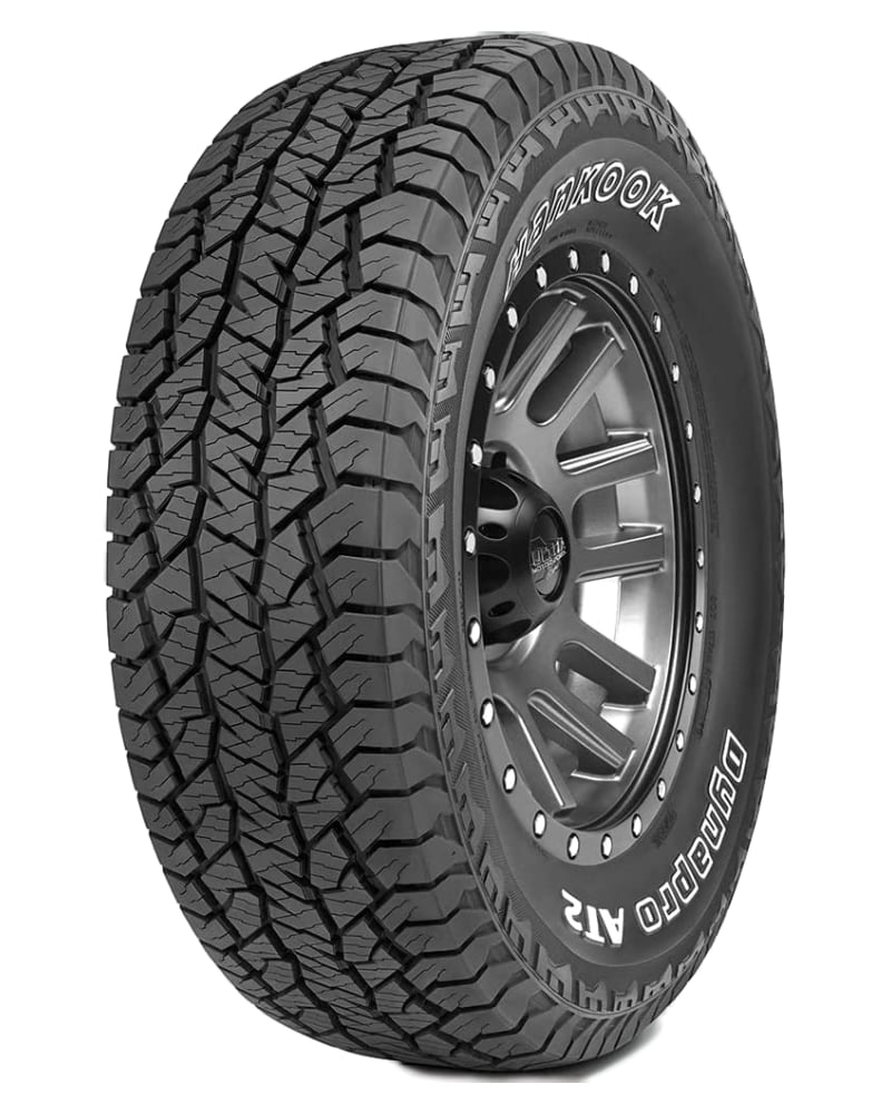 an all terrain tire on a white background.