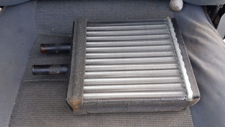 a close up of a radiator on a vehicle.