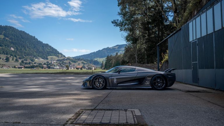 a sports car parked on the side of a road.