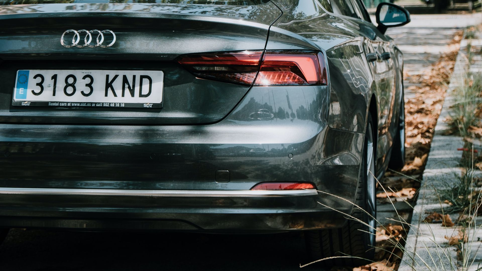 a car parked on the side of the road.