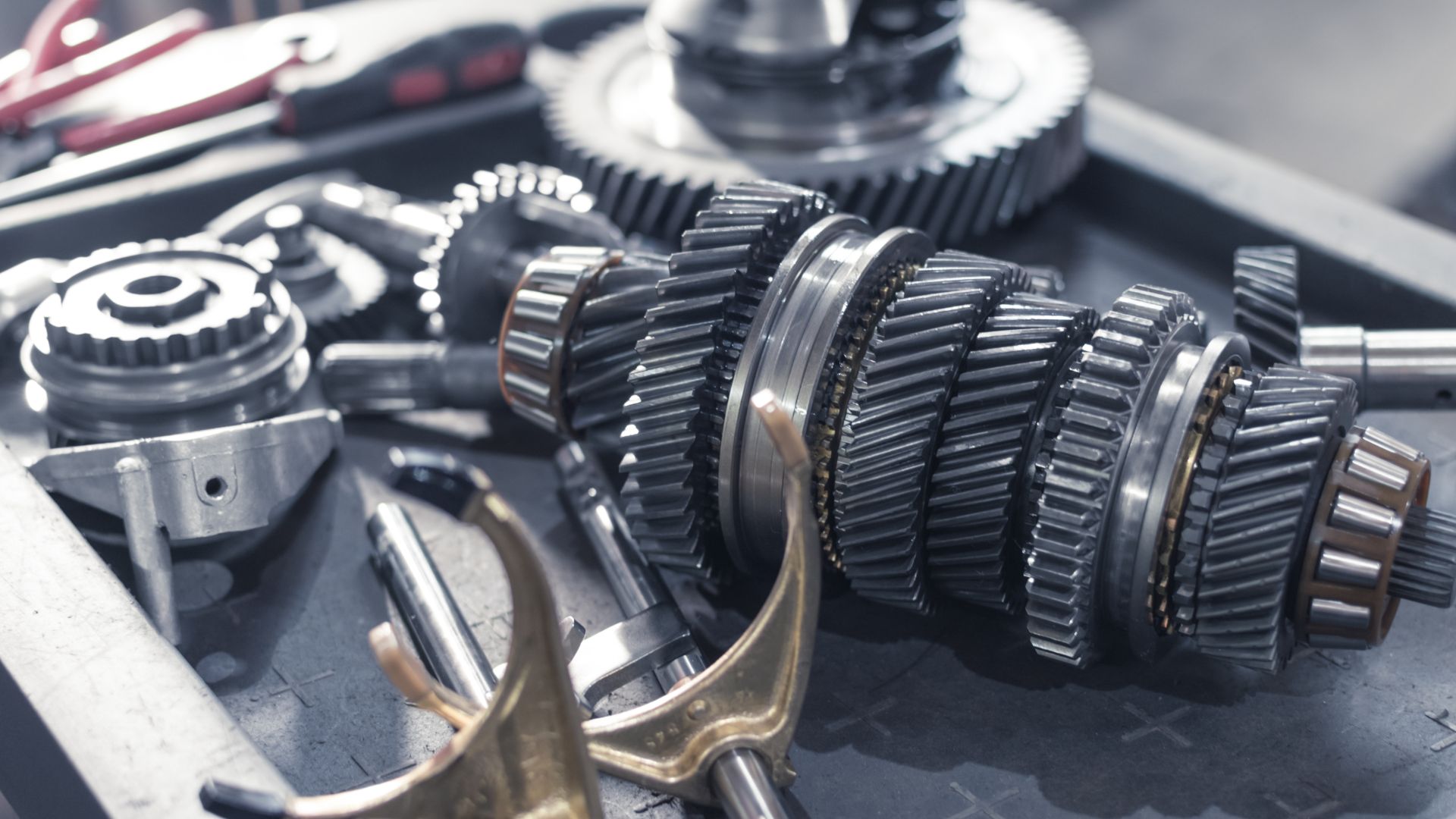 a close up of a set of gears and tools.