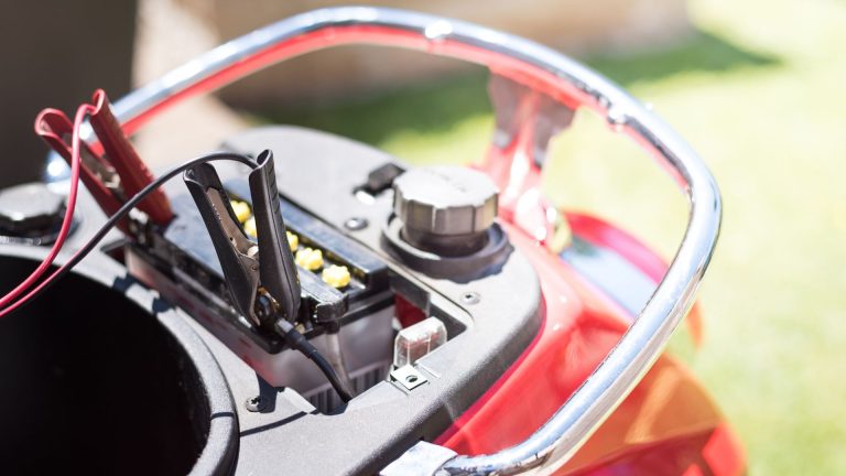 a close up of a motorcycle's battery box.