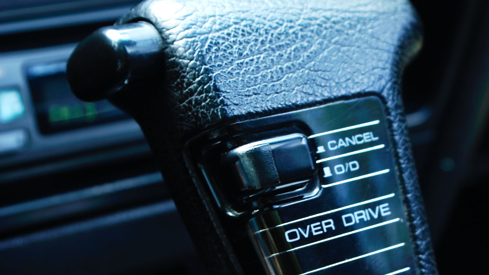 a close up of a button on a car radio.