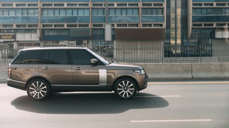 a range rover parked on the side of the road.