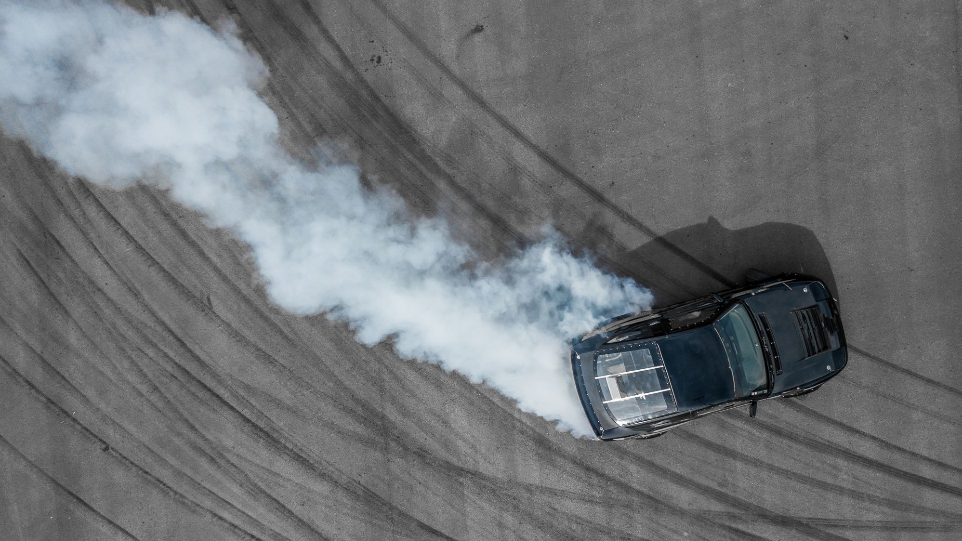 a car with a lot of smoke coming out of it.