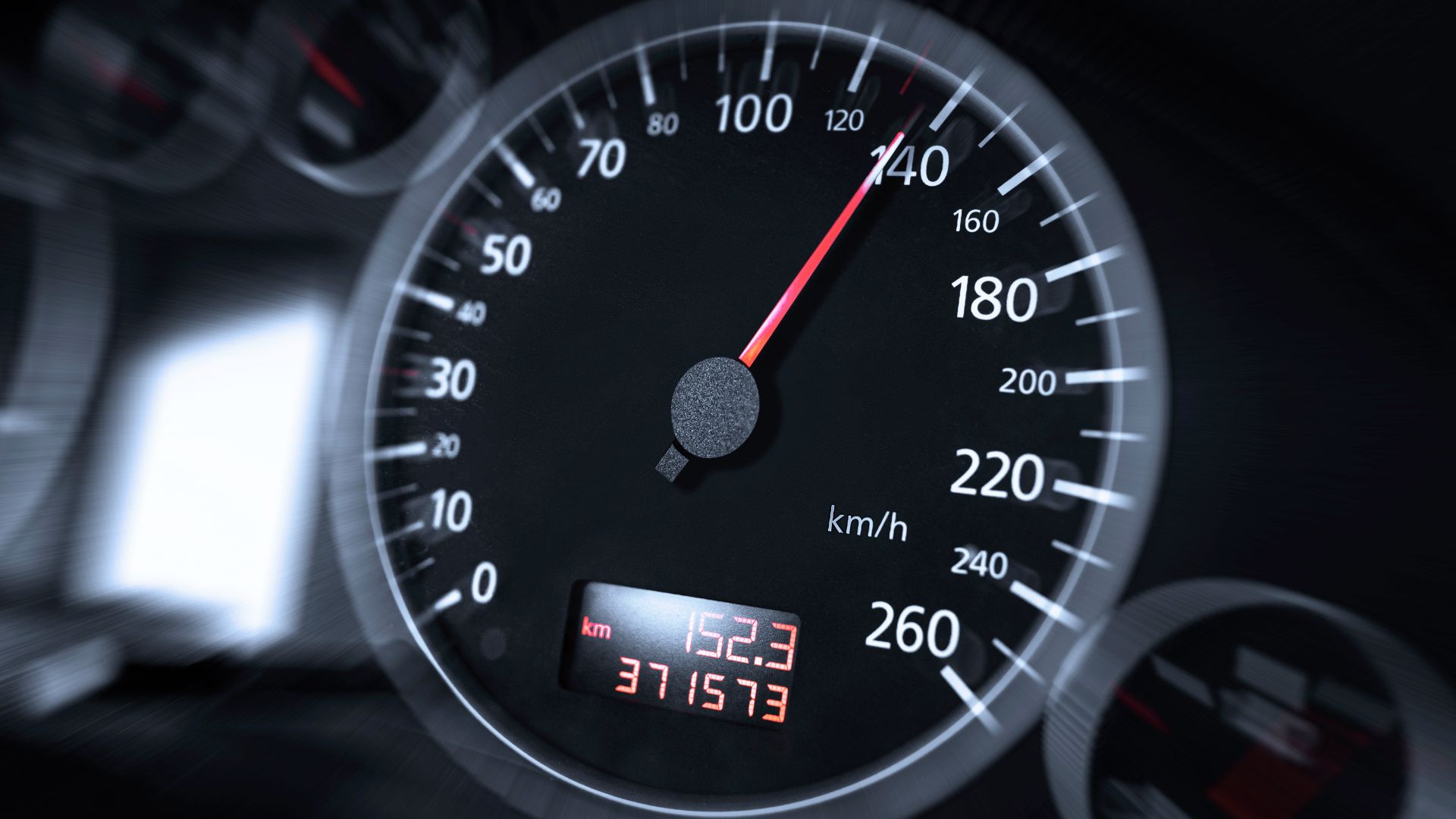 a close up of a speedometer in a vehicle.