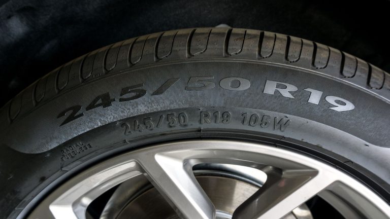 a close up of a tire on a car.