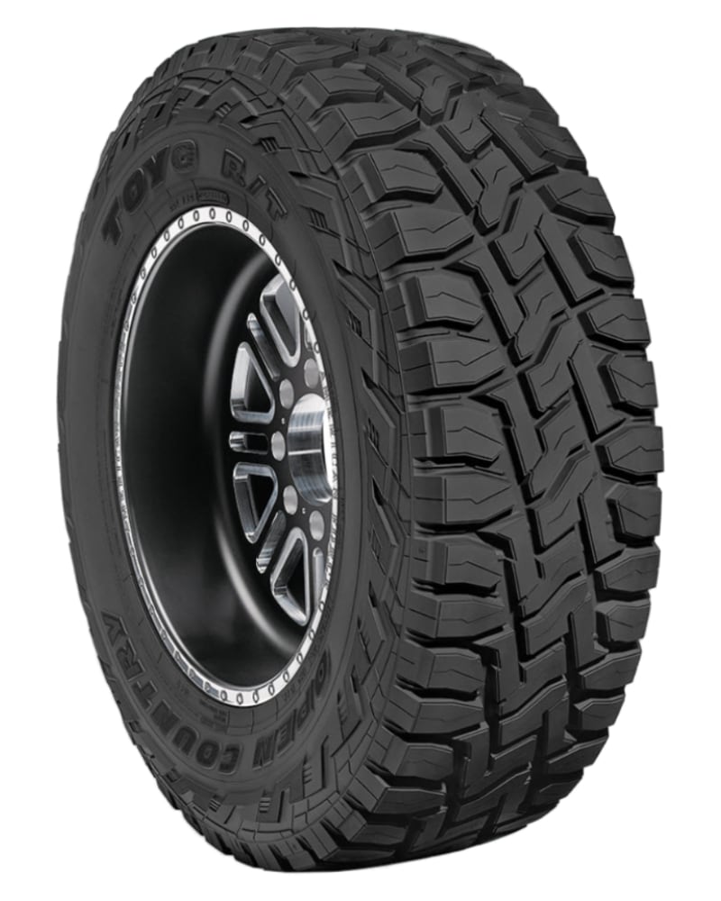 an all terrain tire on a white background.