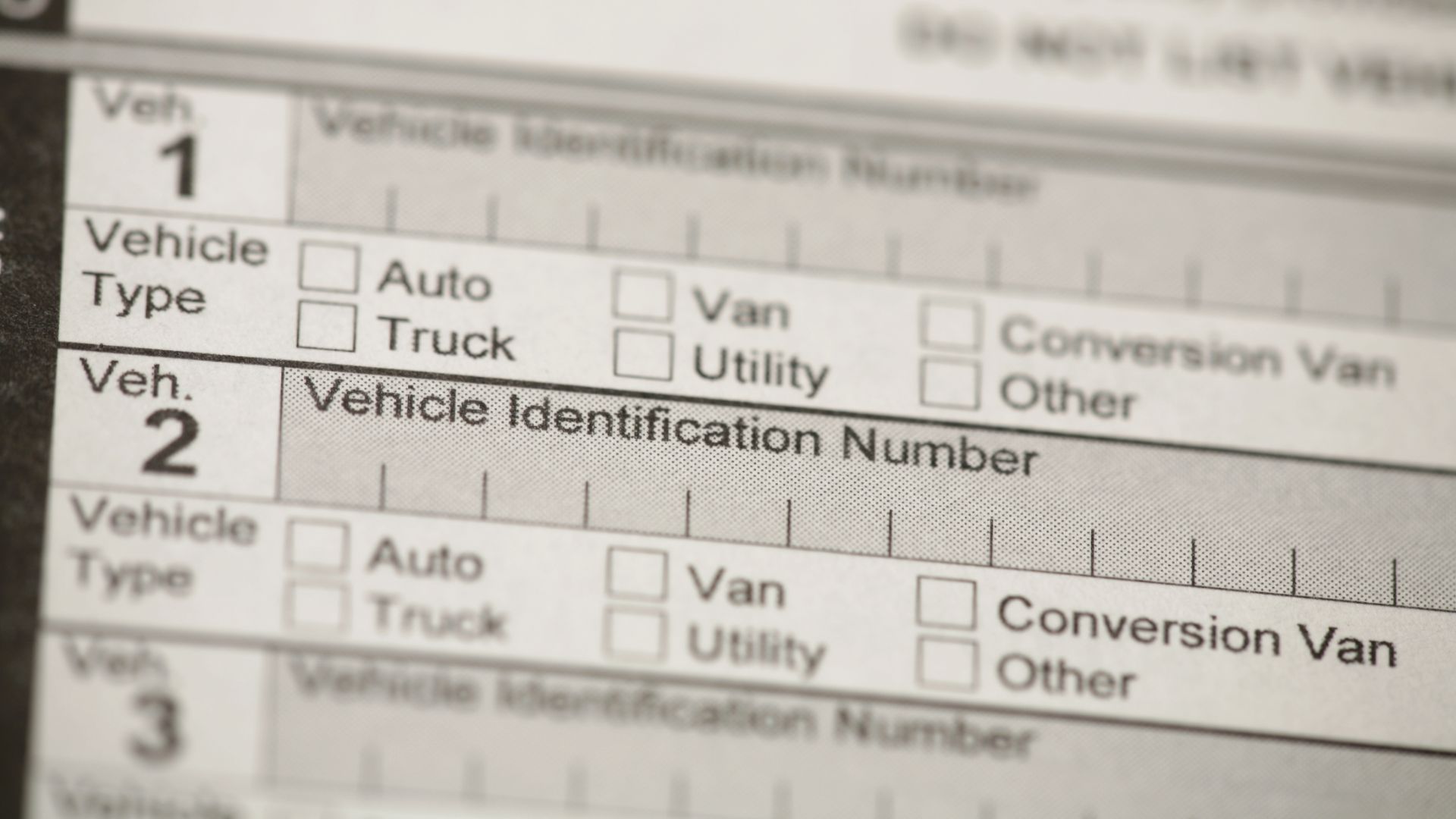 a close up of a vehicle identification sheet.