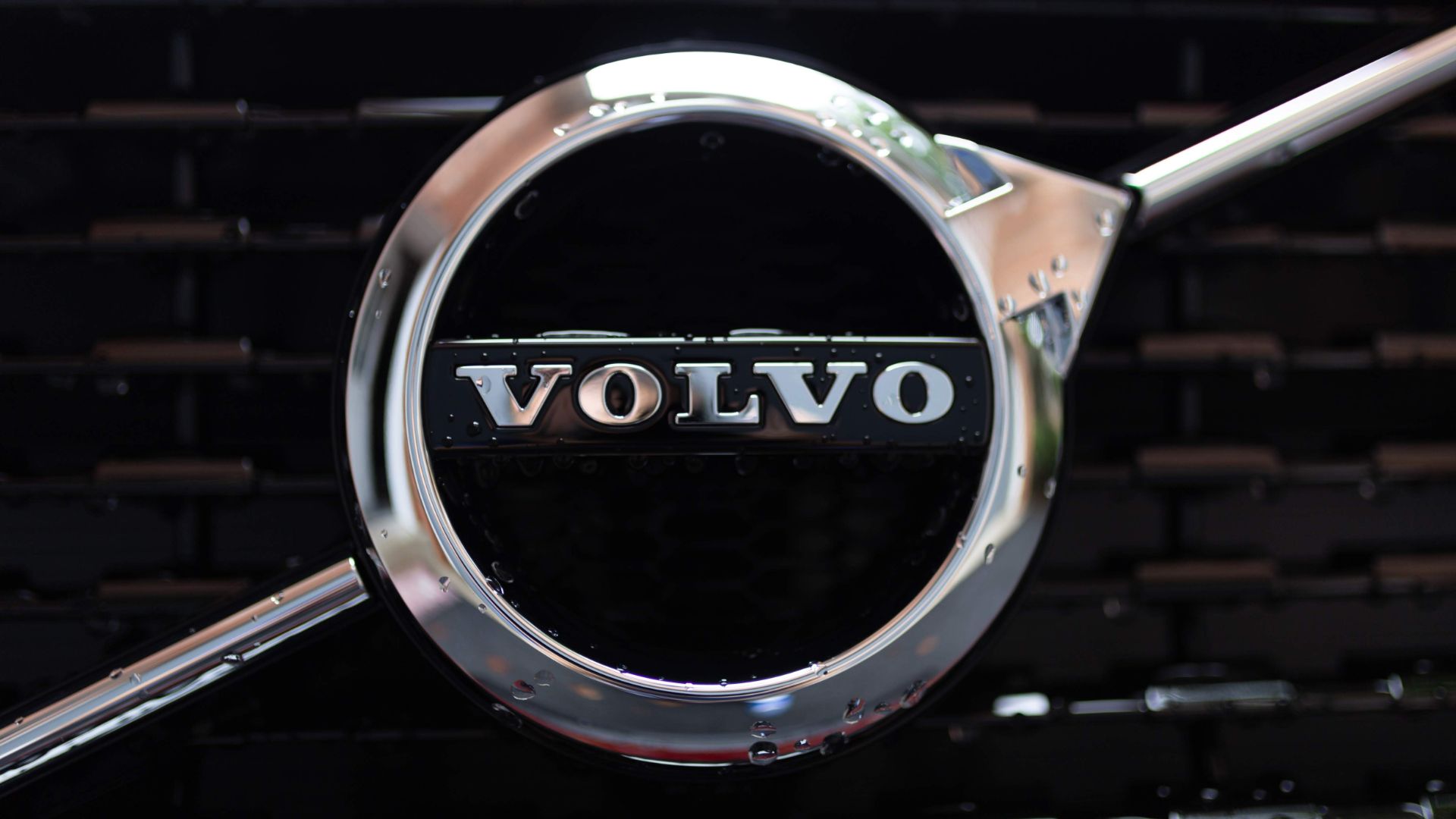 a volvo emblem on the front of a car.